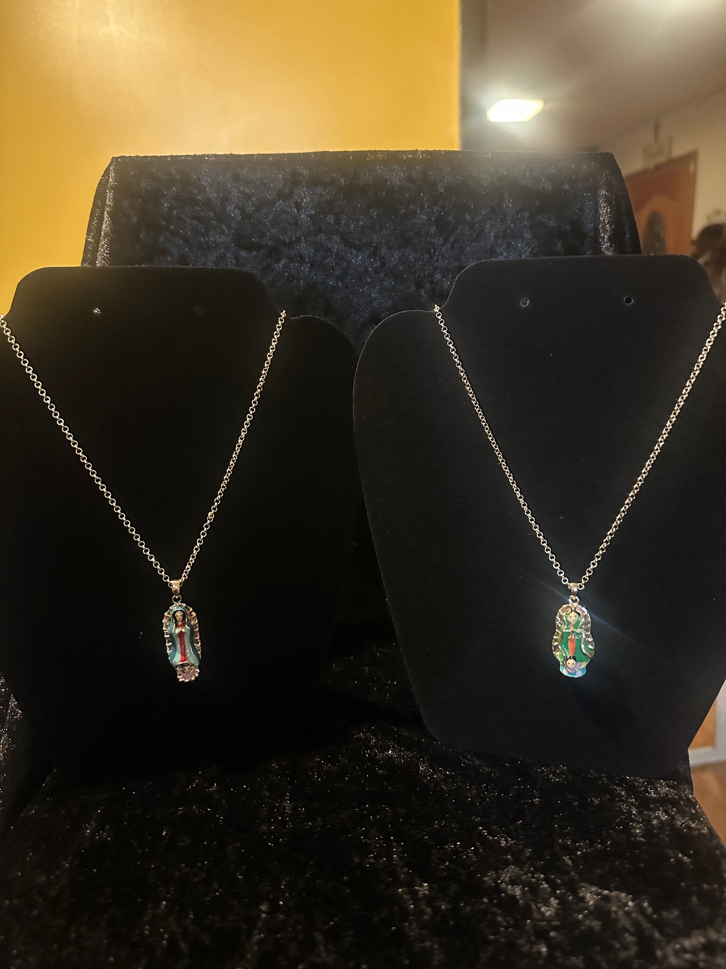 18k gold plated chain and virgin Guadalupe pendant.